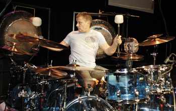 Carl Palmer playing at a drum kit