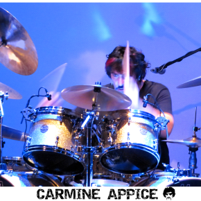 Drummer Carmine Appice behind the kit