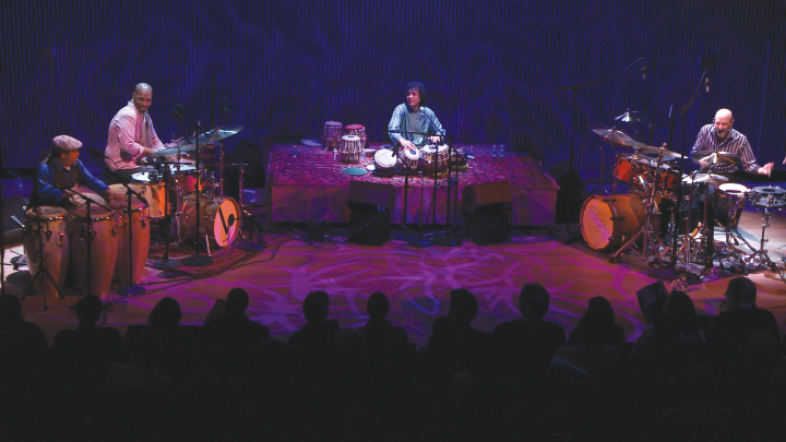 From left: Giovanni Hidalgo, Eric Harland, Zakir Hussain, and Steve Smith work out some high-level cross-cultural music on stage at the SFJazz Center, March 2013.