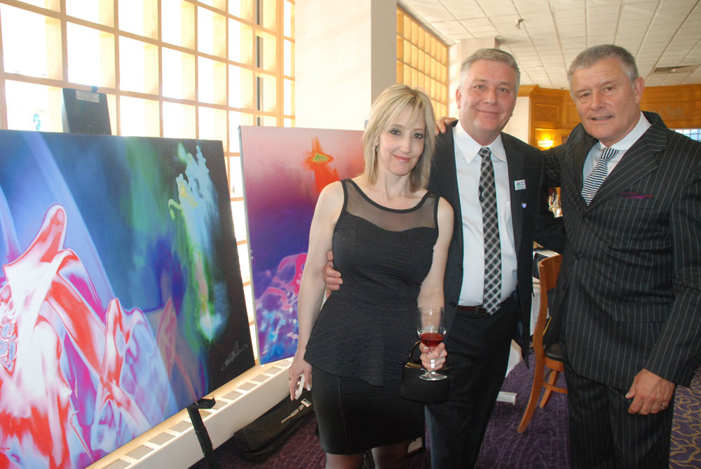 Carl Palmer with fans who purchased his art to aid Camp Good Days & Special Times (for children with cancer), the American Cancer Society, and the Child Advocacy Center of Philadelphia.